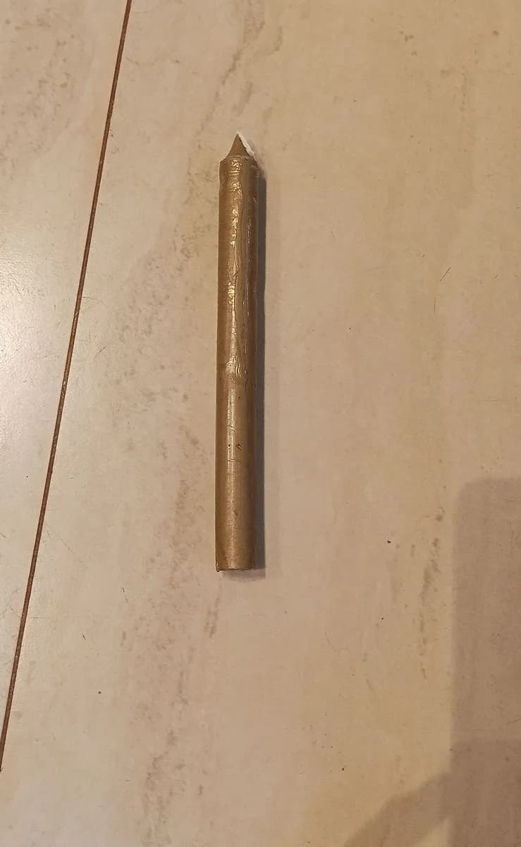 Vela palito dourada