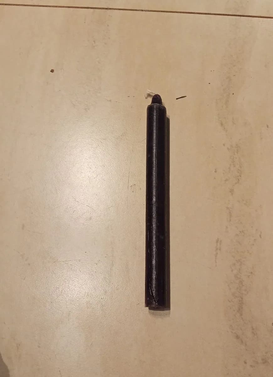 Vela palito preta